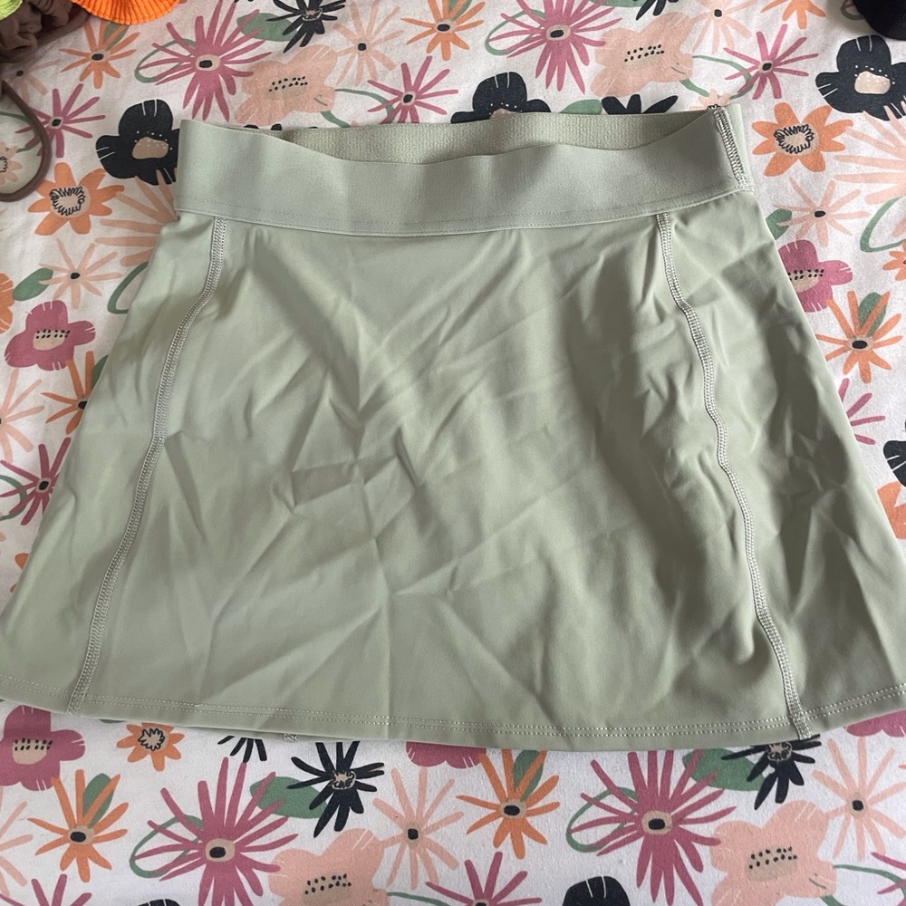 TnAction TnaSLICK™ Court Micro Skirt